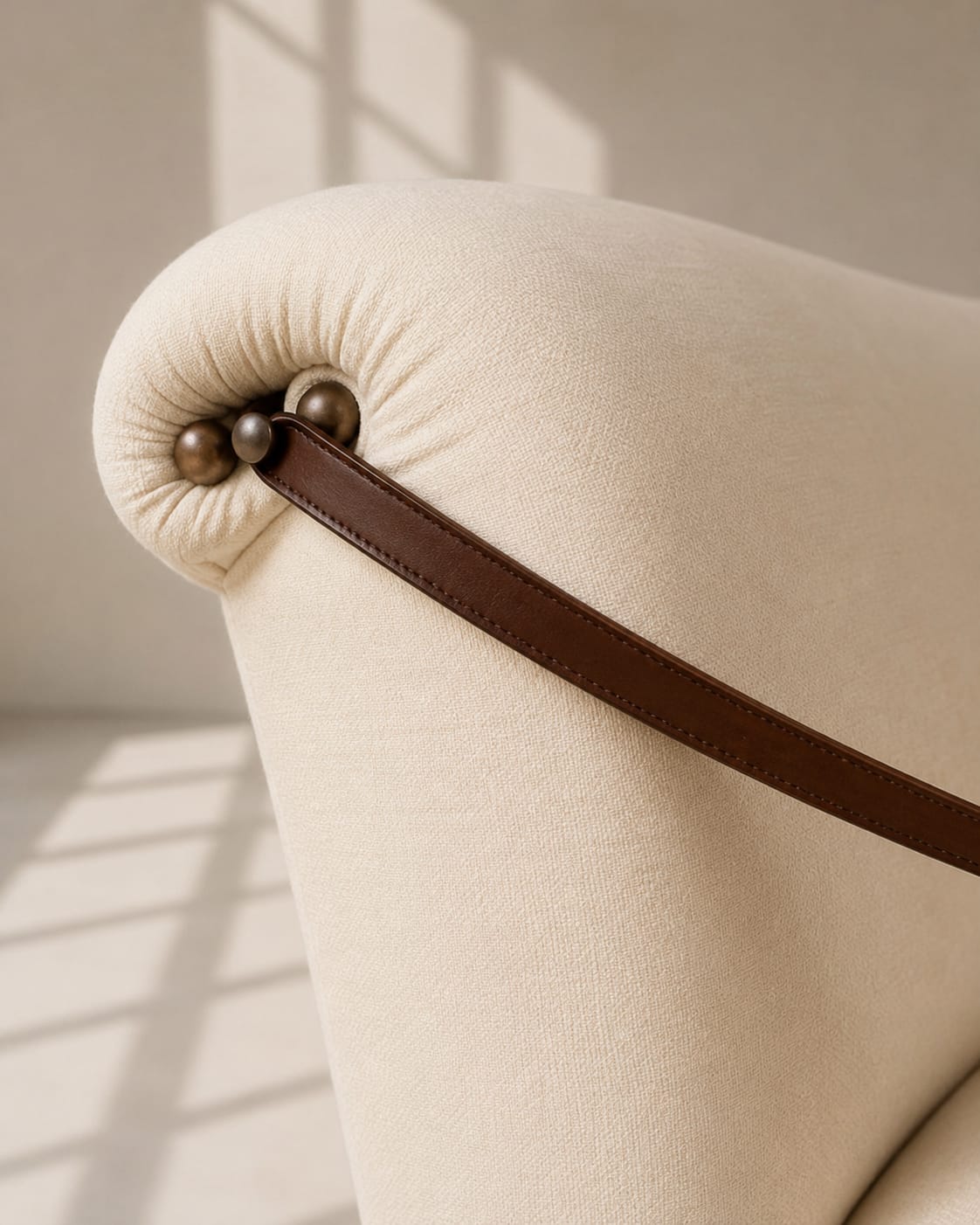 Rear and side view of the hand carved horse sofa showing the finished frame and carving from behind