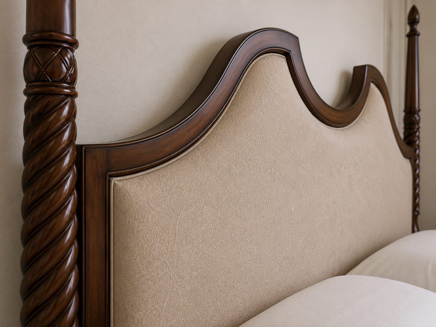 Handcrafted teak bed frame photographed during finishing, showing grain and colour depth